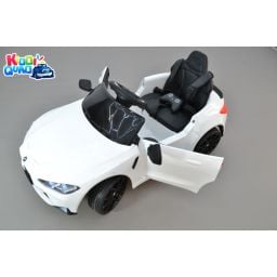 BMW M4 blanc, voiture électrique enfant 12 Volts télécommande parentale 2.4 Ghz, 2 moteurs